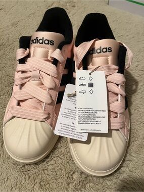 adidas Pink Low-Top Sneakers with Black Stripes and Cream Sole